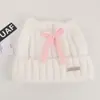 Gorro de punto de mezcla de lana de alta calidad con un lazo y orejas de gato, diseñado para mujeres, perfecto para otoño e invierno, proporcionando calidez y protección para los oídos, y haciendo que el rostro parezca más pequeño