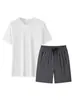 Traje deportivo casual de verano para hombre, conjunto corto transpirable de seda helada para correr y actividades al aire libre, conjunto de dos piezas de manga corta y pantalones cortos hasta la rodilla, talla grande
