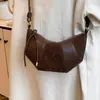 Moda Otoño Nuevo Bolso Ligero de Lujo de Hombro Único para el Trabajo Simple 2026 Cruzado Debajo del Brazo para Mujer Gran Capacidad de Mano