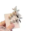 Elegante pinza para el pelo de perlas estilo coreano, pinza lateral, dulce y linda, nuevo modelo 2026 para mujer, pinza curva, pinza de pico de pato, accesorio para el pelo, adorno para la cabeza