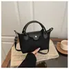 Nova Bolsa de Mão Feminina Fosca, Bolsa de Mão Portátil para o Dia a Dia em Formato de Bolinho, Bolsa de Ombro Feminina, Bolsa Transversal, Simples e Estilosa