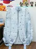Mochila texturizada de cielo azul nublado con estrellas para estudiantes, que ofrece un ambiente de campus de ensueño, adecuada para clases, vacaciones y uso casual, bolsa versátil de doble hombro