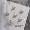 Nuevos Accesorios para Uñas Qiansi Mengdie Circonia Tres Dimensionales Doble Capa Super Brillantes Mariposa Terminada Pila de Diamantes Decoración de Uñas Venta al por Mayor