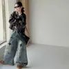 Conjunto de chaqueta de cuero para niñas otoño e invierno 2026 casual estilo coreano para niñas mayores chaqueta de cuero encerado y conjunto de jeans