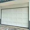 Puerta de garaje abatible con control remoto eléctrico para villa, puerta enrollable de aleación de aluminio y espuma de acero de color europeo, puerta de persiana elevadora industrial