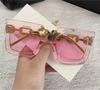 Nuevas gafas de sol con cadena de eslabones cruzados anti-ultravioleta moda europea y americana caja de gafas de sol de alto diseño femenino ventas directas de fábrica