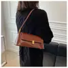 Bolsa de Axila com Textura de Alta Qualidade Retrô Feminina 2026 Nova Bolsa de Ombro Único de Nicho Francês Versátil Elegante Bolsa Baguete