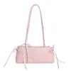 Bolsa de mão doce de nicho estilo coreano para mulheres, novo modelo primavera 2026, bolsa de ombro/axila com laço única e moderna