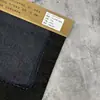 Tela de Mezclilla Oscura Lisa Cvc70/30 70 Algodón 30 Poliéster Mezclilla Que No Se Deslava Tela para Ropa Venta al por Mayor
