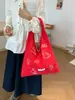 La nueva bolsa de axila de lona de nailon Henggeng con bordado de pájaros de nicho para mujer es una bolsa versátil, ligera, de secado rápido y de gran capacidad.