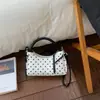Bolsa de mão fofa estilo coreano com bolinhas Shuai Mi Jia, novo modelo 2026 para meninas, bolsa cilíndrica de mão, bolsa de ombro e transversal