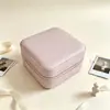 Popular en Europa y América, joyero compacto y portátil, caja de almacenamiento de accesorios de cuero, bolsa de almacenamiento antioxidante para pendientes, colgantes y anillos