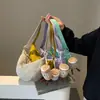 Bolsa Transversal Explosiva Feminina Transfronteiriça 2024 Nova Bolsa de Lona de Nylon Formato Bolinho Versátil de Ombro de Alta Qualidade Pequena Bolsa de Pano