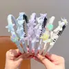 Diadema de concha de estrella de mar color macarrón con dientes antideslizante para niñas ambiente de playa accesorios para el cabello diadema infantil