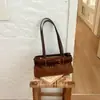Bolso de axila de diseño nicho transfronterizo para mujer, nuevo bolso tote casual y elegante 2026 para ir al trabajo