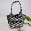 Nuevo bolso de mano de punto para mujer, de poliéster grueso, estéreo, para salir, bolso tejido a juego, disponible al por mayor.