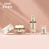 Botella dispensadora dorada galvanizada personalizada, Botella cosmética, Botella para loción, Botella con atomizador de presión para crema y esencia, Botella cuadrada de acrílico