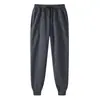 Calça casual masculina tamanho europeu transfronteiriça, calça de moletom jogger cor sólida, calça comprida esportiva casual, forrada com fleece, corte solto, estilo primavera e outono