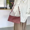 Diseño de Nicho Americano Lujo Ligero Gamuza Retro Cuero Suave Melard Mate Chica Cool Motociclista Bolso de Axila Venta al por Mayor
