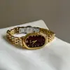 IEKE Nuevo Reloj Ovalado para Mujer Estilo Lujo Ligero Diamante Rojo Cuarzo Exquisito Correa de Acero Reloj para Mujer Venta al por Mayor