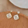 Brincos de Temperamento Novo de Verão Feminino Agulha de Prata S925 Alto Senso Geométrico Natural de Fritillaria Brincos de Açúcar Brincos atacado