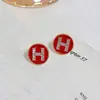Aretes Geométricos Redondos Rojos Angora con Letra H Estilo Coreano Aretes de Moda Francesa Lujo Ligero de Alta Gama Aretes Simples