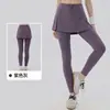Calça de yoga feminina falsa de duas peças com toque nude, amigável à pele, com bolsos, saia-calça esportiva para treino de Pilates, calça fitness anti-exposição
