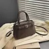 Bolsa de Mão Estilo Western Retrô de Nicho Novo Estilo Inverno 2025 Bolsa Transversal Personalizada Bolsa de Ombro Fashion Simples Tendência