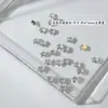 Diamante de Circonia Rosa con Base Plana para Arte de Uñas Modelo Transfronterizo de Cruz Caja de 12 Compartimentos Joyería Brillante de Circonia Rosa Claro de Tamaño Mediano para Uñas