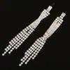 Pendientes de botón con borla y cruz de pedrería populares europeos y americanos venta al por mayor de joyería pendientes de venta caliente E409