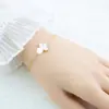 Pulsera Cruzada Europea y Americana de Acero Inoxidable con Trébol de Cuatro Hojas de la Suerte Flor Única Doble Cara No se Desvanece Pulsera Versátil