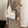Bolsa de ombro feminina transfronteiriça de nicho de luxo, nova, com textura tecida retrô, para usar sob o braço, ombro único, para trabalho, deslocamento, bolsa de mão