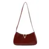 Bolso de mano cuadrado pequeño de moda estilo coreano transfronterizo para mujer, nueva colección de verano 2026, color liso, bolso de hombro elegante, adecuado para ir al trabajo y se puede llevar debajo del brazo
