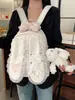 Colección de otoño 2026 de estilo japonés transfronterizo: mochila de encaje con lunares y flores y orejas de conejo, versátil para ir al trabajo, elegante y de alta calidad