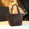Bolso de Mano Genuino Estilo Resort 2026 Nuevo Casual Versátil Pequeño Bolso Tejido de Hombro Bolso Cruzado Simple para Mujer