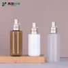 Nueva Botella Pulverizadora Redonda de 80 ml con Atomizador Fino Ximeng en Stock, con Boquilla Dorada Mate, Botella Dispensadora de Producto para Cuidado Facial Hidratante de Color Café