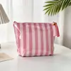 Bolsa de maquillaje impermeable de PVC, nuevo modelo transfronterizo para mujer, neceser rayado de gran capacidad, bolsa de almacenamiento de viaje versátil, fábrica