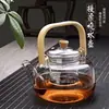 Chaleira de Chá de Vidro Espesso Resistente ao Calor ao Redor da Lareira Fogão Elétrico de Cerâmica Conjunto para Preparo de Chá Doméstico Conjunto de Chaleira para Ferver Água com Viga Elevatória Venda Direta