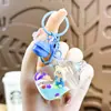 Chaveiro Urso Sonhador Desenho Animado Areia Movediça Menina Boneca Leite em Pó Casal Fofo Pingente de Bolsa Pequeno Presente Atacado
