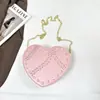 Bolsa Transversal Shuai Mijia 2026 Verão Nova Nicho Retrô Com Tachas Camurça Coração Cruzada Bolsa de Mão Casual