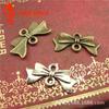 A1005 fábrica de duas cores opcional 0.7g arco retrô diy jóias atacado acessórios retrô 100/bag
