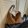Bolso de mano retro de gamuza para mujer 2026 Nuevo Mochila de gran capacidad para el trabajo Bolso de hombro cruzado multifuncional