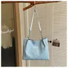 Bolsa tote de grande capacidade para estudantes, adequada para a aula e o trajeto, design de nicho estiloso, bolsa de ombro casual