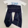Calça de Moletom Cropped Azul Marinho Estilo Americano com Barra Curva para Homens, Temporada de Outono, Costura Exposta, Calça Flare com Caimento, Calça Esportiva Casual High Street