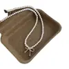 Collar de Perlas con Lazo Suave Estilo Coreano Moda Femenina Elegante Nicho Gama Alta Versátil para el Trabajo Dulce Cadena para la Clavícula