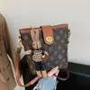 Bolso Cubo Vintage Floral de Alta Gama Transfronterizo para Mujer 2026 Nuevo Bolso de Hombro para Mujer con Estampado Retro Bolso Cruzado Versátil