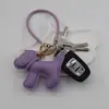 Funda para teléfono con borla de cachorro linda creativa, correa para llavero de coche, accesorio para bolso, universal para teléfonos móviles