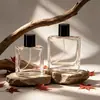 En stock: Botella de perfume cuadrada de vidrio transparente y plana de 15 mm, botella con spray continuo, botella recargable tipo prensa, botella vacía, gama alta