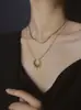 Colar Corrente Osso de Cobra Pingente Sol Empilhado Dupla Camada Estilo Americano para Mulheres, Design Nicho de Luxo Leve High-End Corrente Clavicular