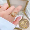 [Galvanoplastia de ouro real] Design Europeu e Americano ins Wind Geometry Diamond Ball Ring Anel Aberto de Vento Frio para Mulheres